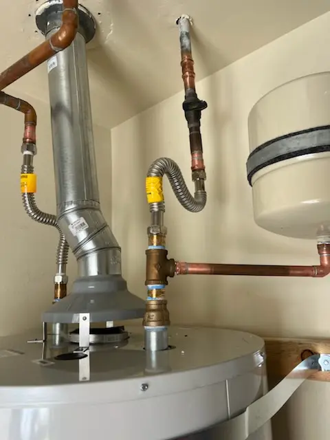Water heater installation and plumbing repair in Garnier
